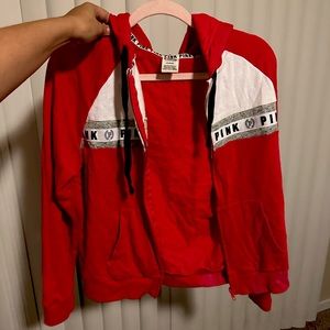 Size medium pink brand red jacket used but great condition